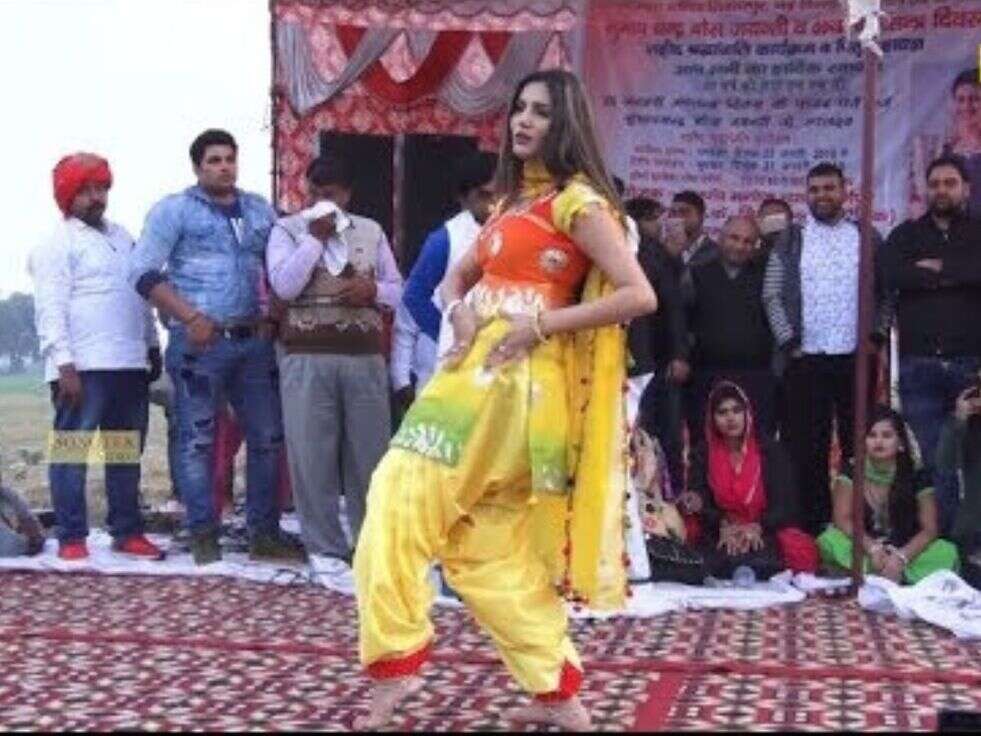 ि