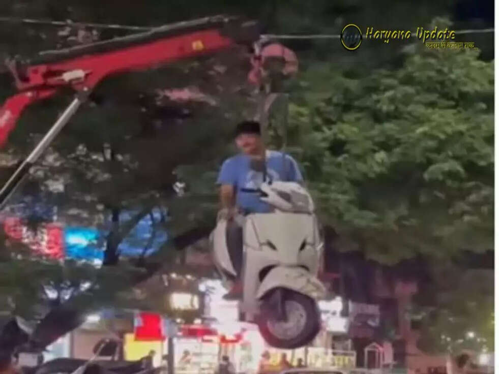 गलत जगह गाड़ी को पार्क करना पड़ा भारी, स्कूटी के साथ शख्स का भी हुआ ये हाल 